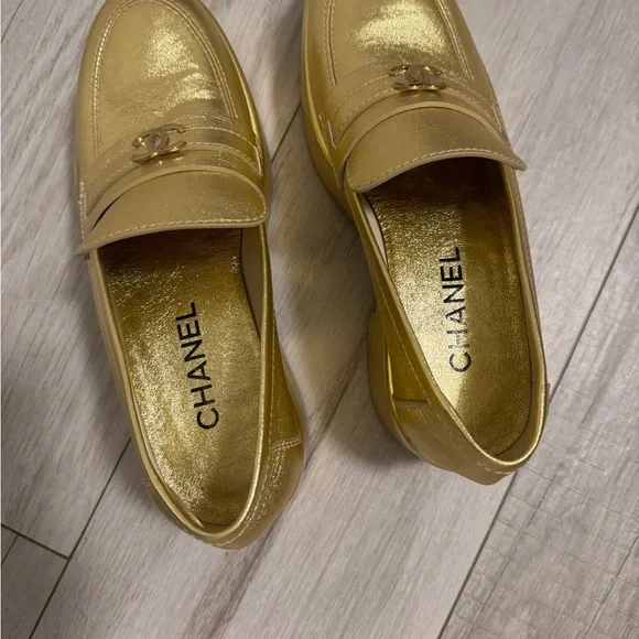 CHANEL Gold Flats Luxurious Metallic Loafers